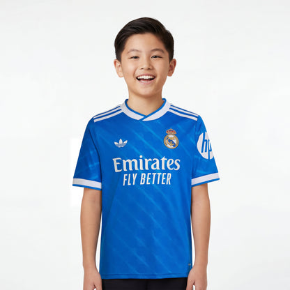 Kids Real Madrid 25/26 third blue youth jersey with adidas and emirates
